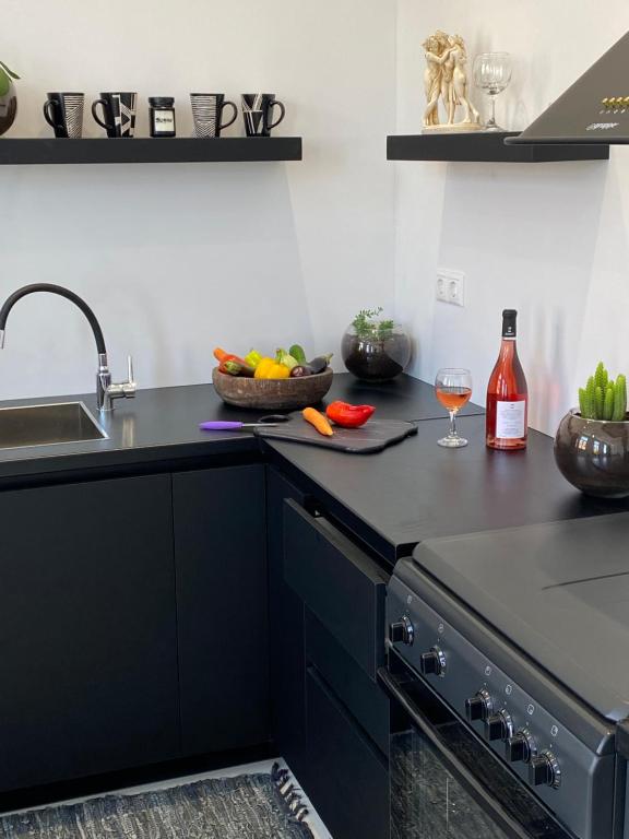 Kuchyňa alebo kuchynka v ubytovaní Artelie apartment
