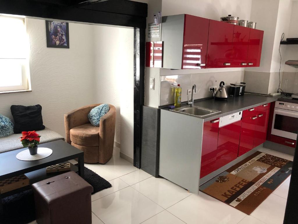 Kuchyň nebo kuchyňský kout v ubytování Seven‘S Apartments I