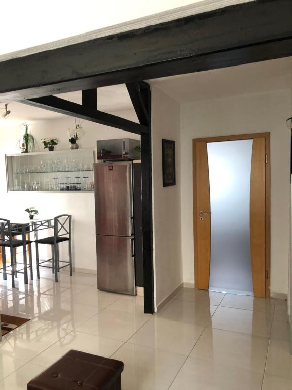Kuchyň nebo kuchyňský kout v ubytování Seven‘S Apartments I