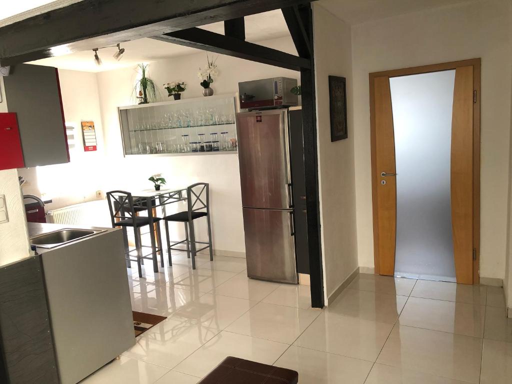 Kuchyň nebo kuchyňský kout v ubytování Seven‘S Apartments I