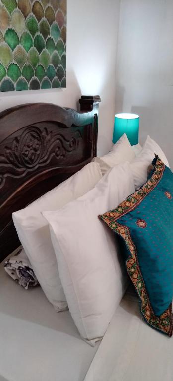Postel nebo postele na pokoji v ubytování Lajuela BnB & Hostel
