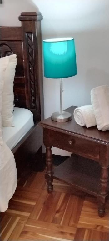 Postel nebo postele na pokoji v ubytování Lajuela BnB & Hostel
