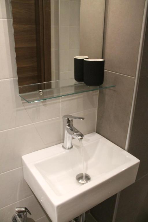 A bathroom at Studio City Center
