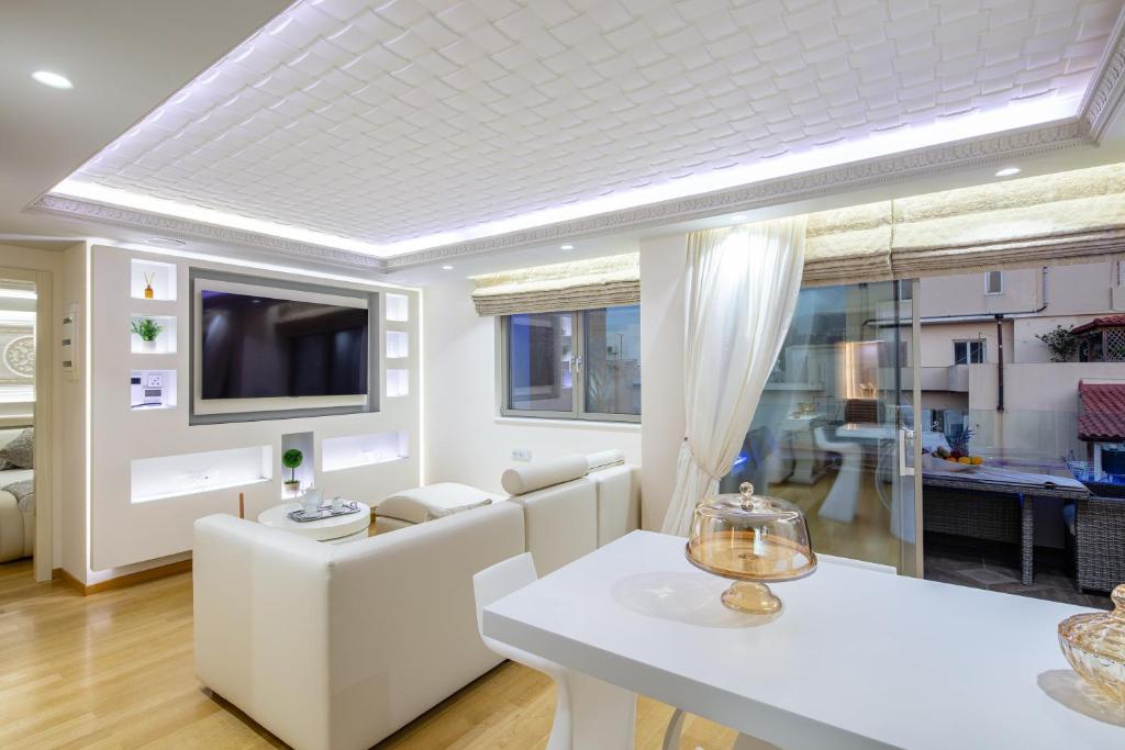Posezení v ubytování De President Suite, DeMaNi President Suites