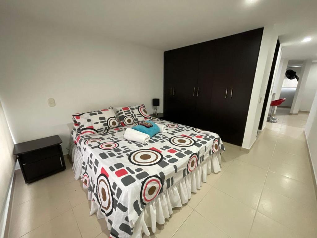 Postel nebo postele na pokoji v ubytování Lindos apartaestudios y habitaciones en Ibague