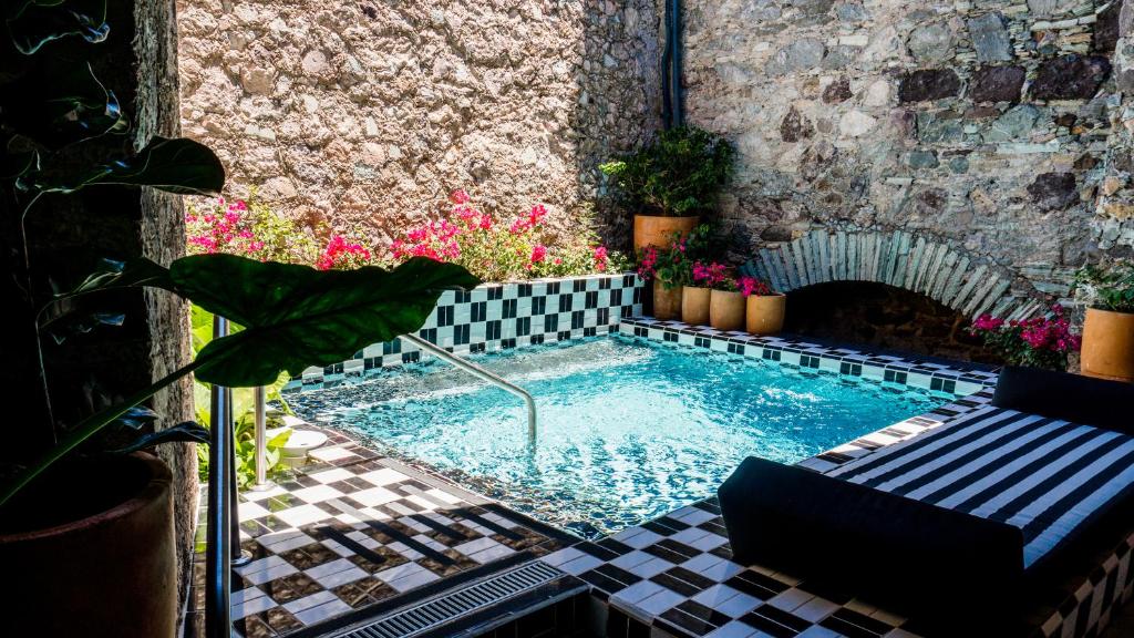 Bazén v ubytování Hotel Abadia Tradicional nebo v jeho okolí