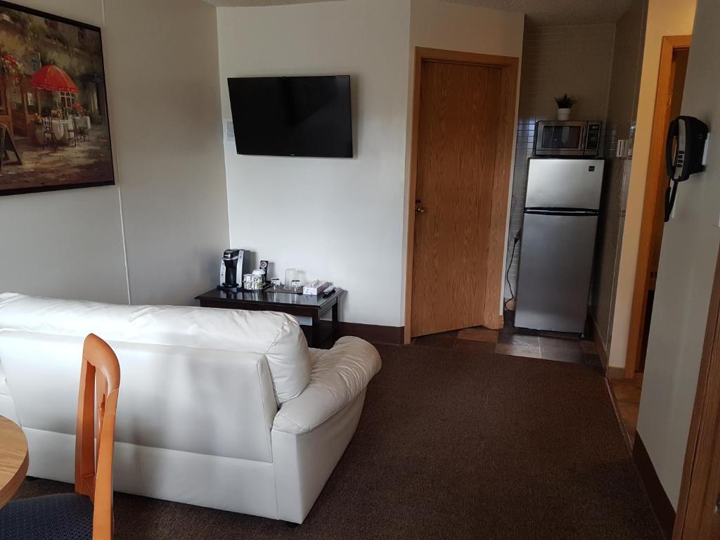 Kuchyň nebo kuchyňský kout v ubytování Pines Motel