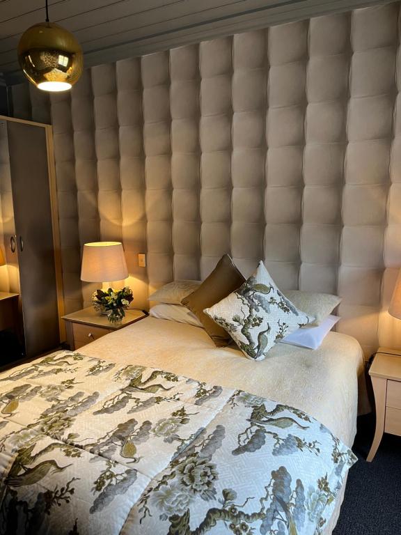 Katil atau katil-katil dalam bilik di Nice Hotel