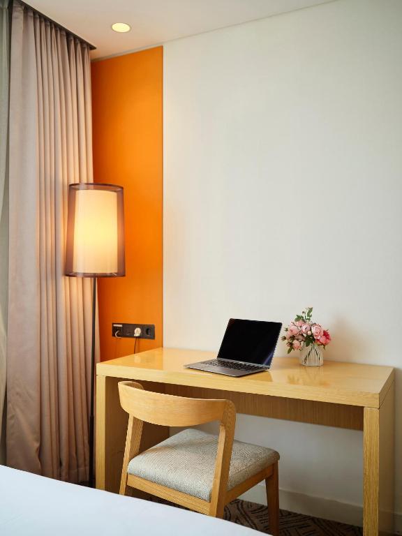 TV a/nebo společenská místnost v ubytování Jeju Central City Hotel