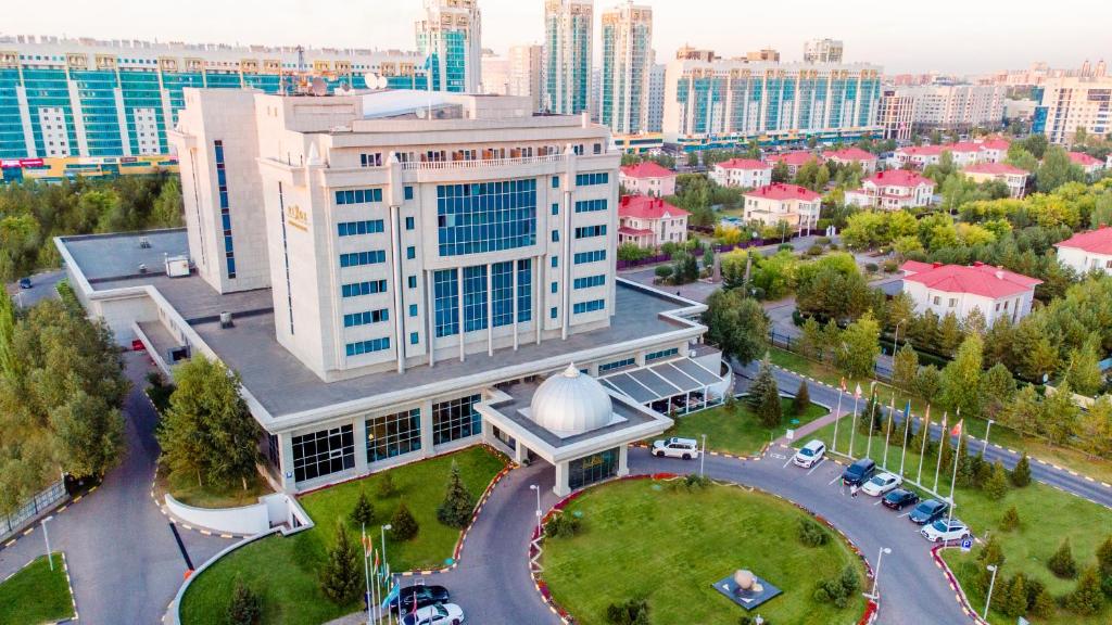 an overhead view of a building in a city at Rixos President Hotel Astana in Astana