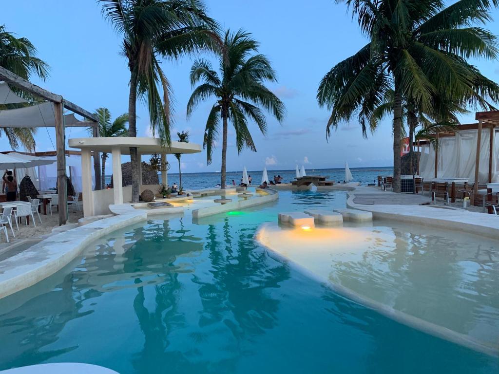 Foto principal de NASIM CONDO HOTEL con Acceso Beach Club Mandarino