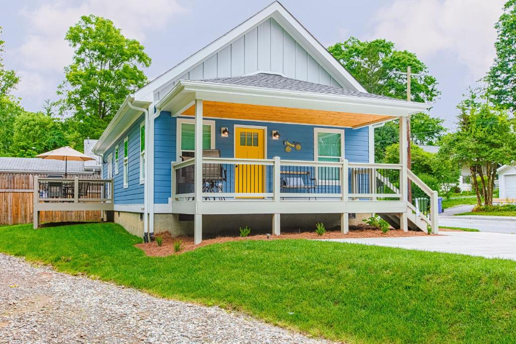 a house with a blue and orange at Blue House on Blythe in Hendersonville