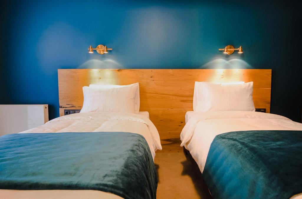 Una cama o camas en una habitación de Suatis Resort Kazbegi