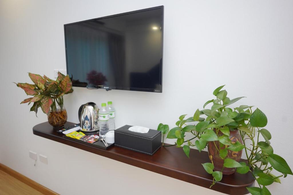 TV a/nebo společenská místnost v ubytování Hanoi Capital Premium Hotel