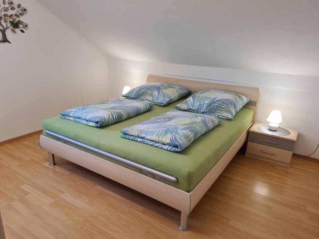 Postel nebo postele na pokoji v ubytování Ferienwohnung Graf Konrad