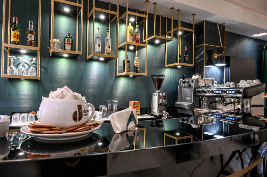Kuchyň nebo kuchyňský kout v ubytování Roma Domus Hotel
