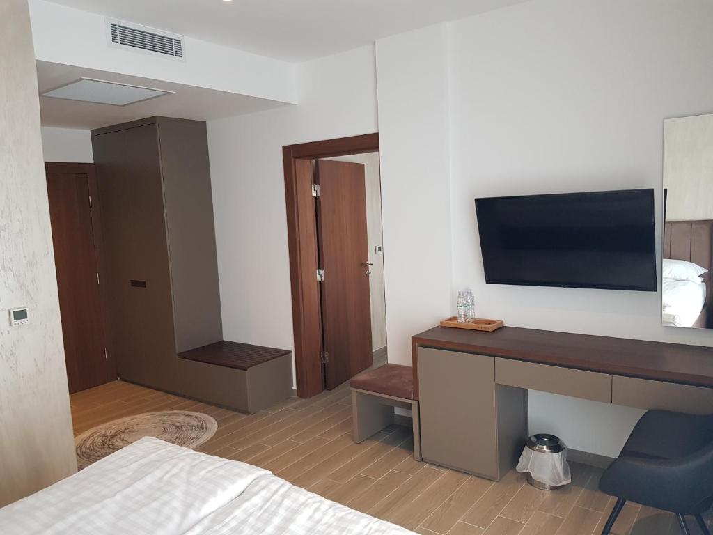 TV a/nebo společenská místnost v ubytování MY HOTEL