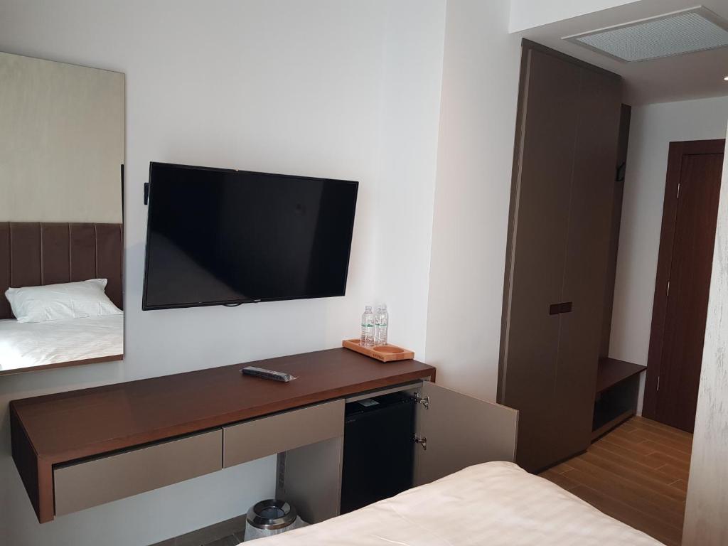 TV a/nebo společenská místnost v ubytování MY HOTEL