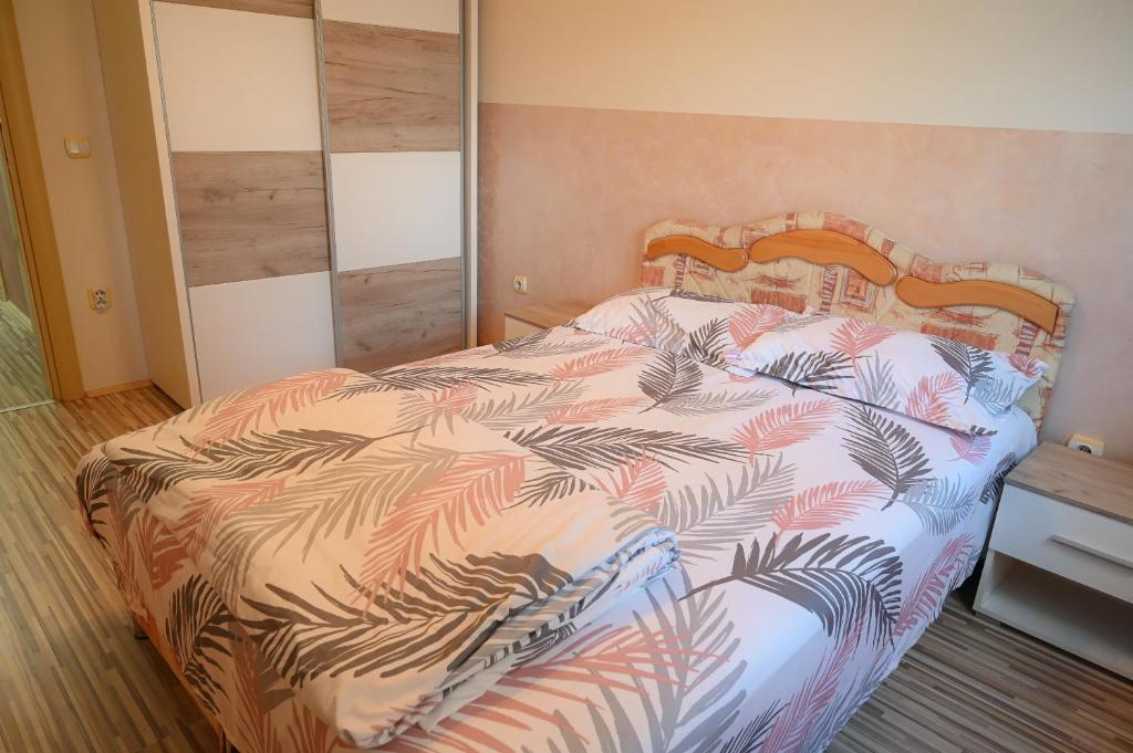 Postel nebo postele na pokoji v ubytování MB Apartments
