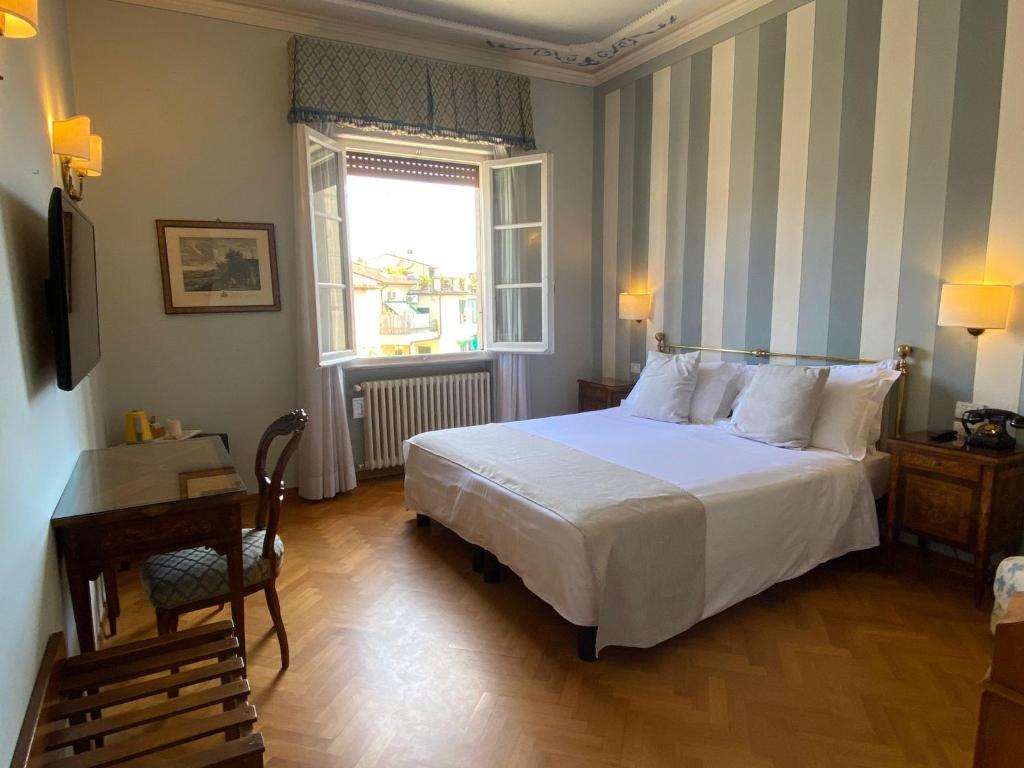 Postel nebo postele na pokoji v ubytování Hotel David