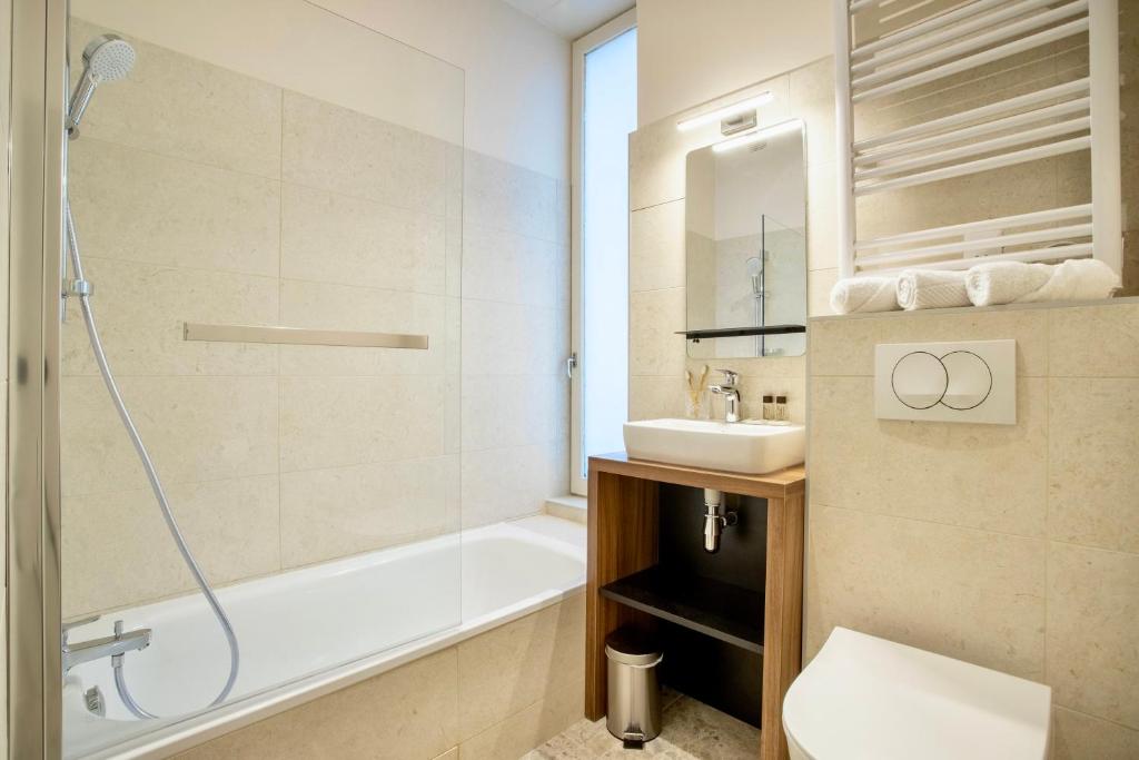 Koupelna v ubytování Hôtel Tête d'or
