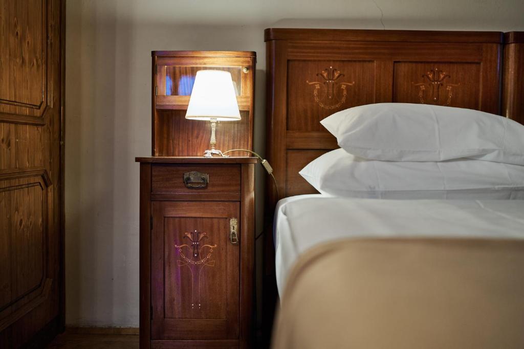 Postel nebo postele na pokoji v ubytování Schloss Drosendorf