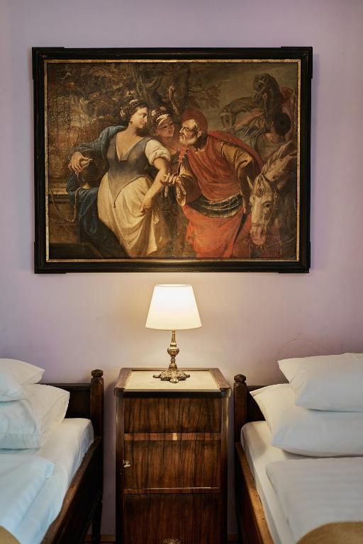 Postel nebo postele na pokoji v ubytování Schloss Drosendorf