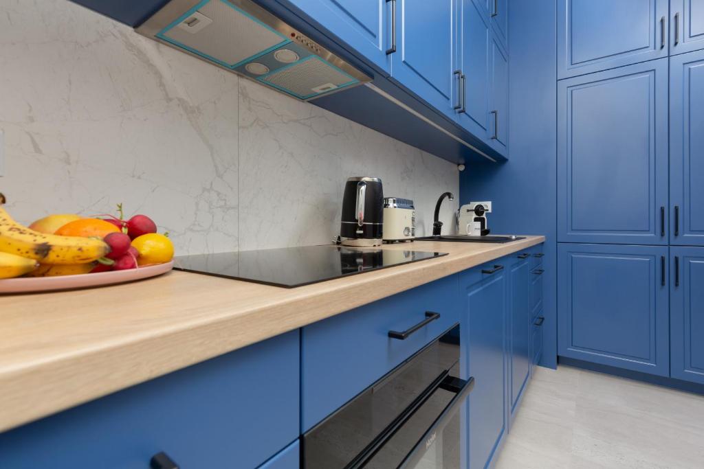 Kuchyňa alebo kuchynka v ubytovaní Łazienki Park Residence by Renters Prestige