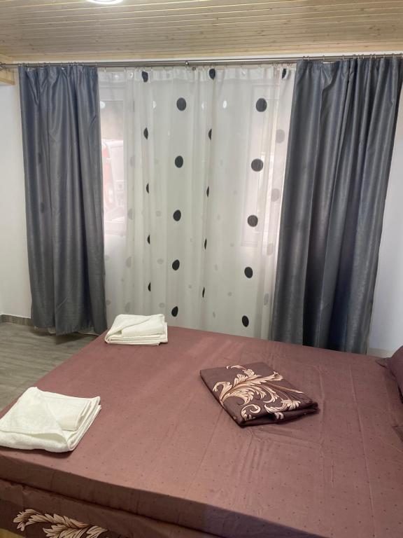 Postel nebo postele na pokoji v ubytování CASA DAVID