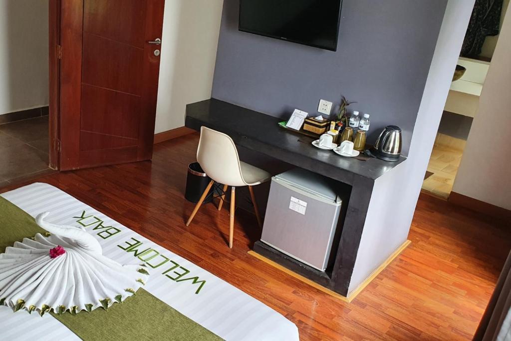 Postel nebo postele na pokoji v ubytování Siem Reap Tevi Residence