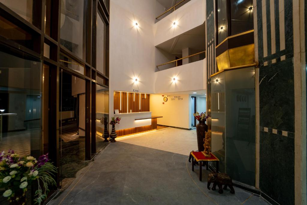 Postel nebo postele na pokoji v ubytování Hotel Kewal