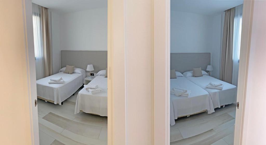 Postel nebo postele na pokoji v ubytování AZAHAR BEACH Red Apartments & Spa