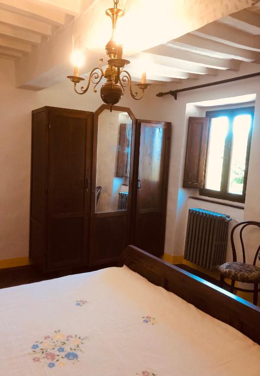 A bed or beds in a room at MEA CASA Toscana