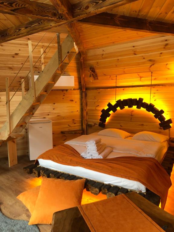 Postel nebo postele na pokoji v ubytování Afara Bungalows Otel & Cafe