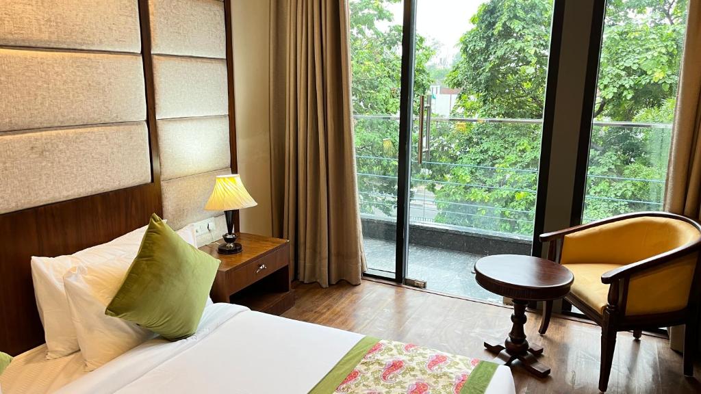 Postel nebo postele na pokoji v ubytování IP Royal Hotel - New Delhi
