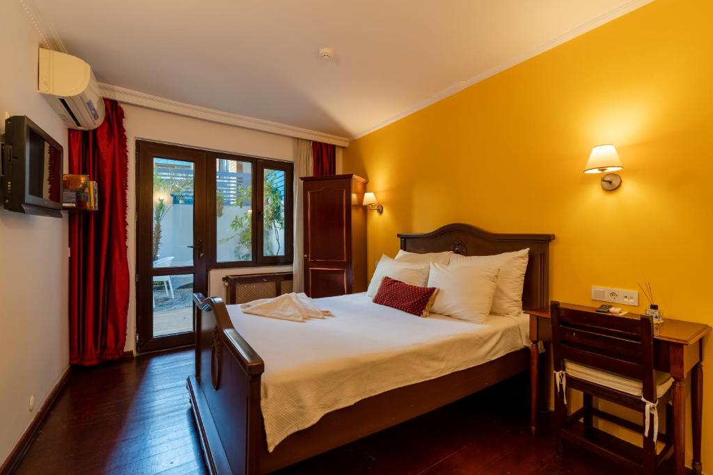 Postel nebo postele na pokoji v ubytování Şebnem Hotel