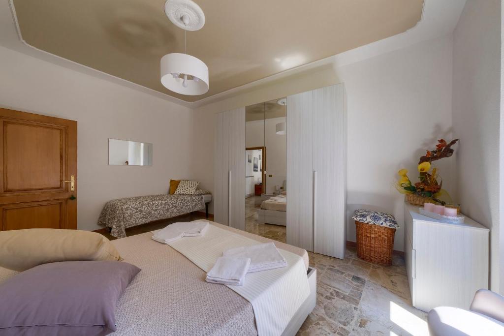 Łóżko lub łóżka w pokoju w obiekcie Mugello Circuit - B & B - L'aia dì Trippa all'Aria