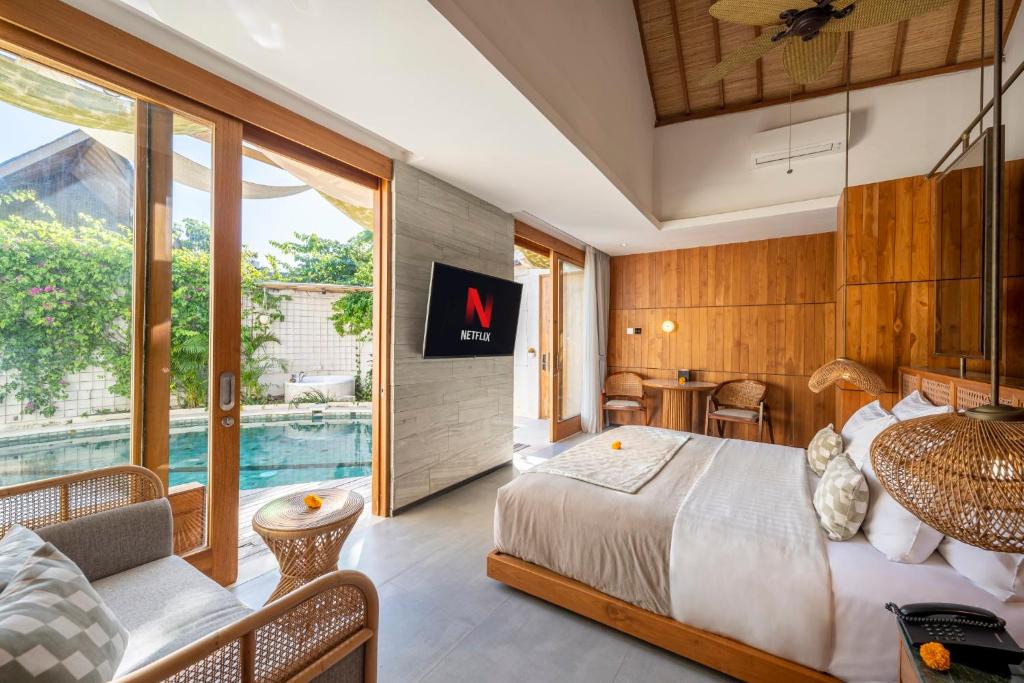 TV a/nebo společenská místnost v ubytování Sini Vie Luxury Resort & Spa Seminyak by Ini Vie Hospitality