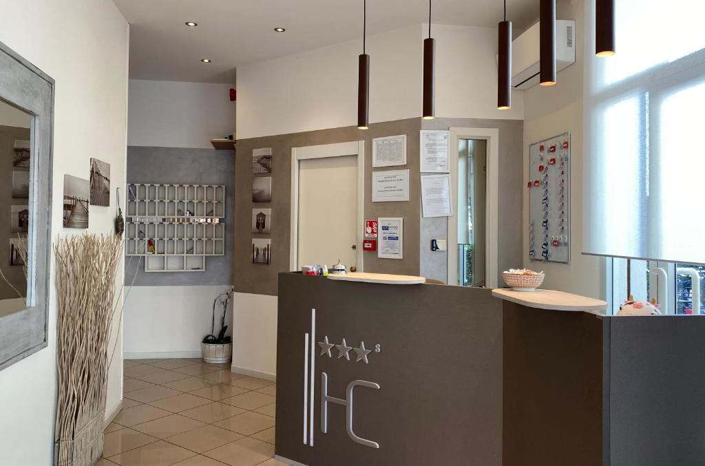 Kuchyň nebo kuchyňský kout v ubytování Hotel Conchiglia