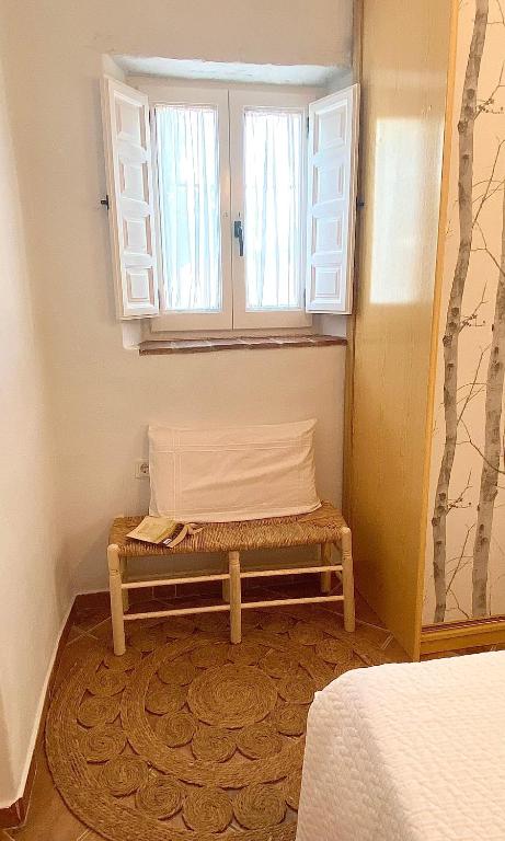Postel nebo postele na pokoji v ubytování Casa Ofelia