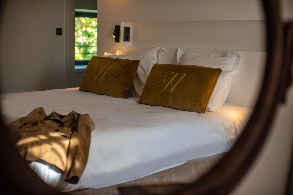 Postel nebo postele na pokoji v ubytování Hôtel Villa Walbaum