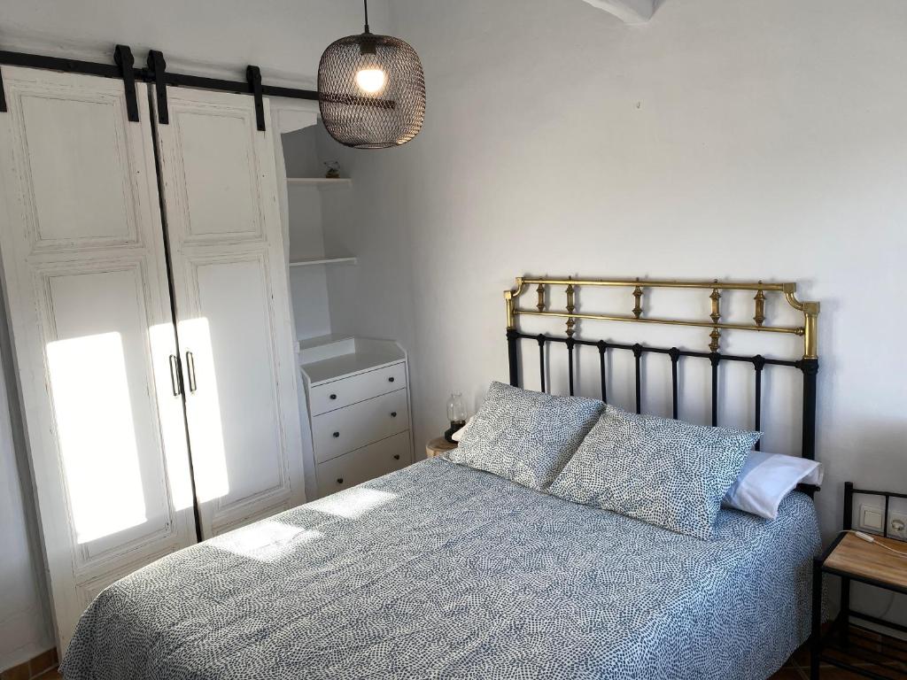 Postel nebo postele na pokoji v ubytování Casa Ofelia