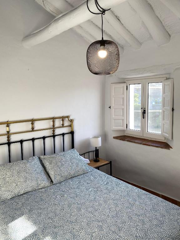 Postel nebo postele na pokoji v ubytování Casa Ofelia