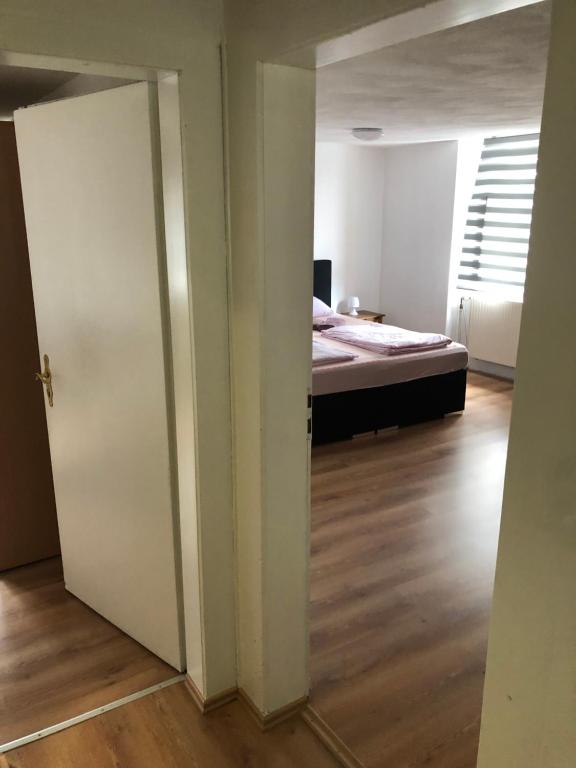 Postel nebo postele na pokoji v ubytování Seven‘S Apartments I
