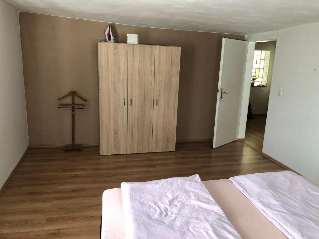Postel nebo postele na pokoji v ubytování Seven‘S Apartments I