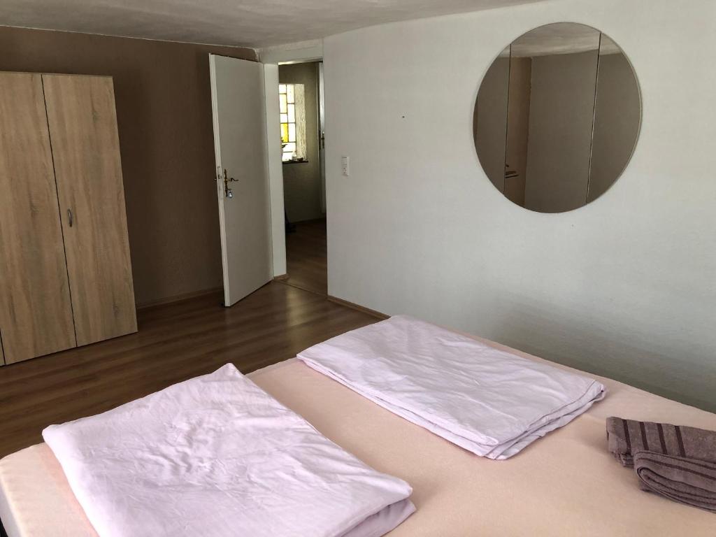 Postel nebo postele na pokoji v ubytování Seven‘S Apartments I