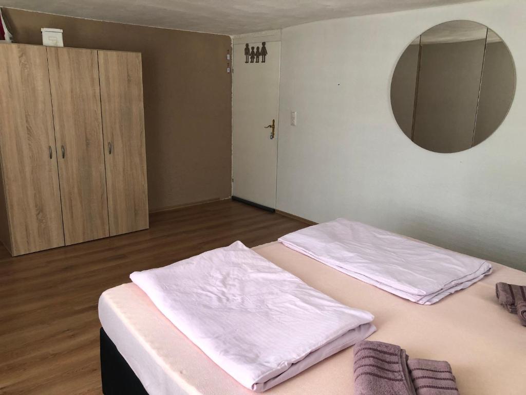 Postel nebo postele na pokoji v ubytování Seven‘S Apartments I