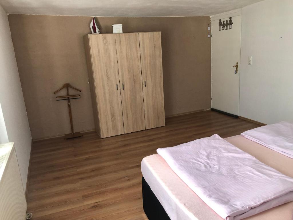 Postel nebo postele na pokoji v ubytování Seven‘S Apartments I
