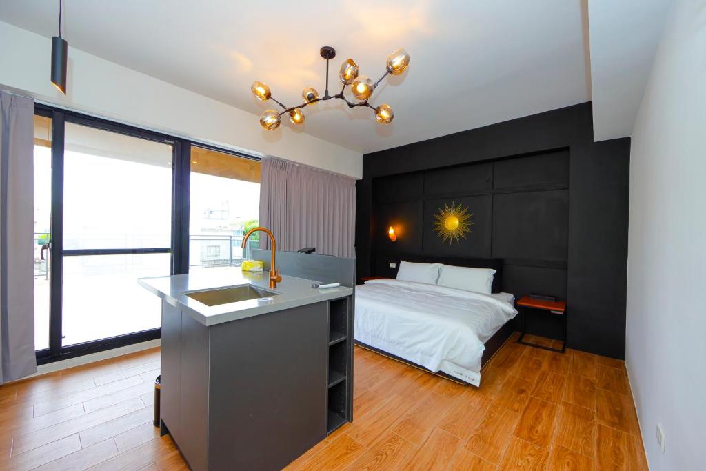 Postel nebo postele na pokoji v ubytování Shui Shang Yuan Homestay
