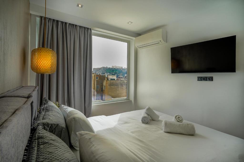 Posteľ alebo postele v izbe v ubytovaní Stylish Living-Parthenon
